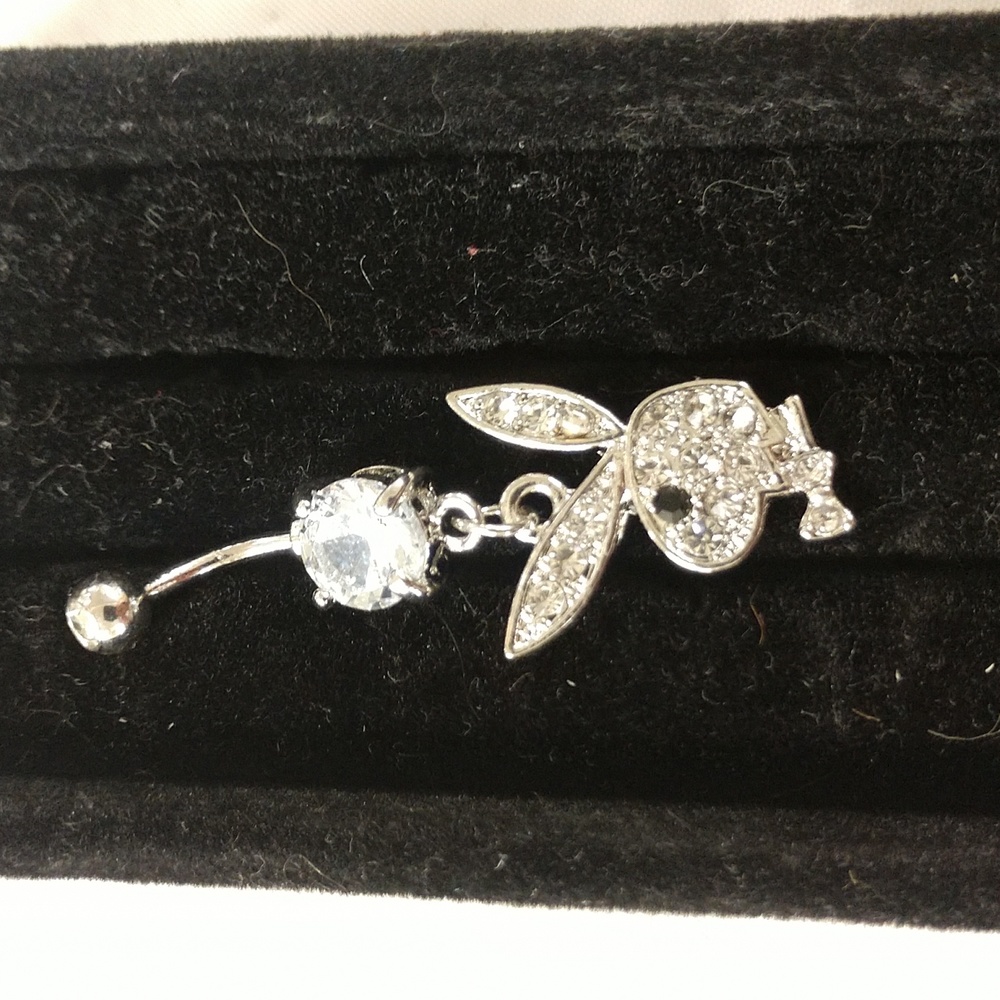 Playboy belly ring